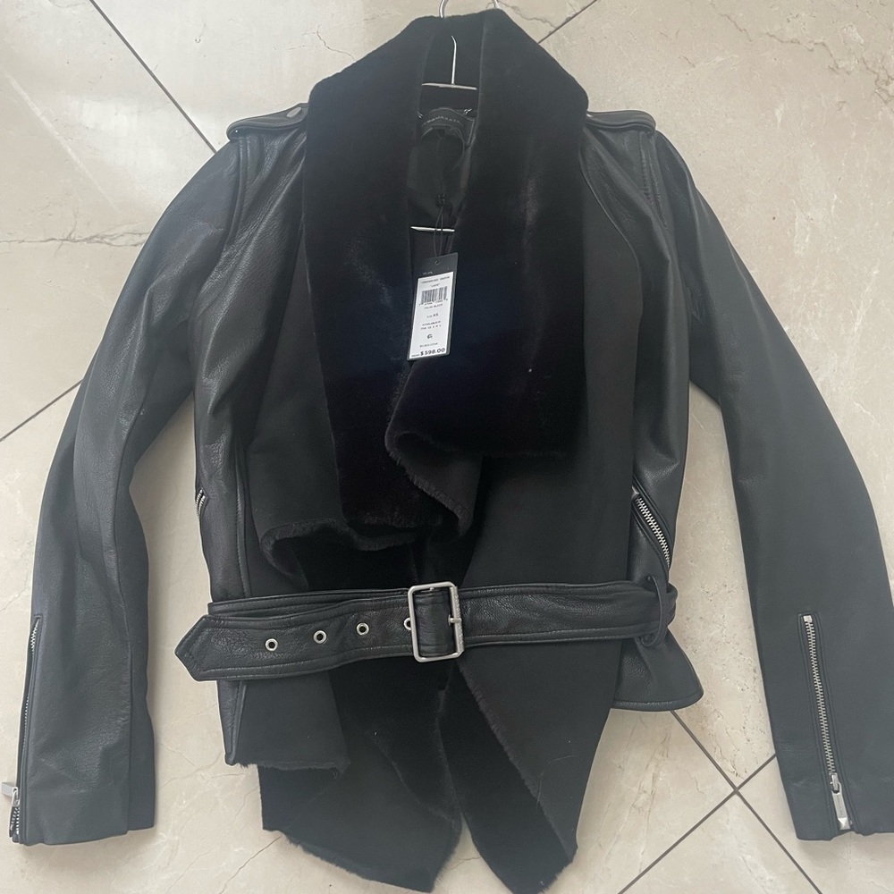 Bcbg jade leather and faux fur jacket.